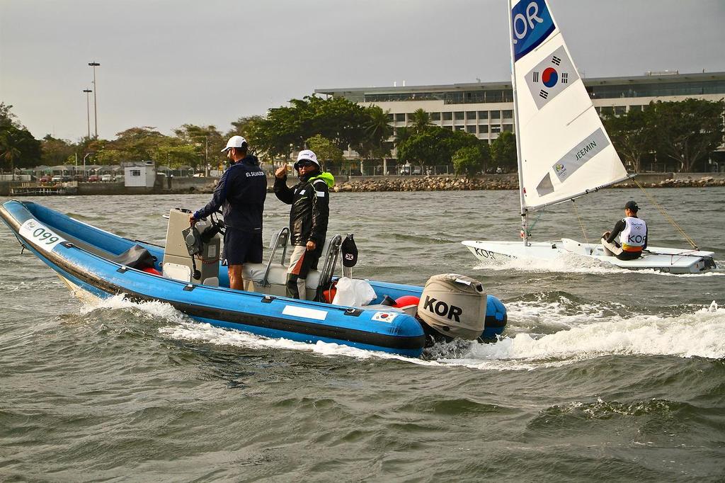 Happy Korean coaches - their sailor did well - Rio Olympics - Day 1, August 8, 2016 photo copyright Richard Gladwell www.photosport.co.nz taken at  and featuring the  class