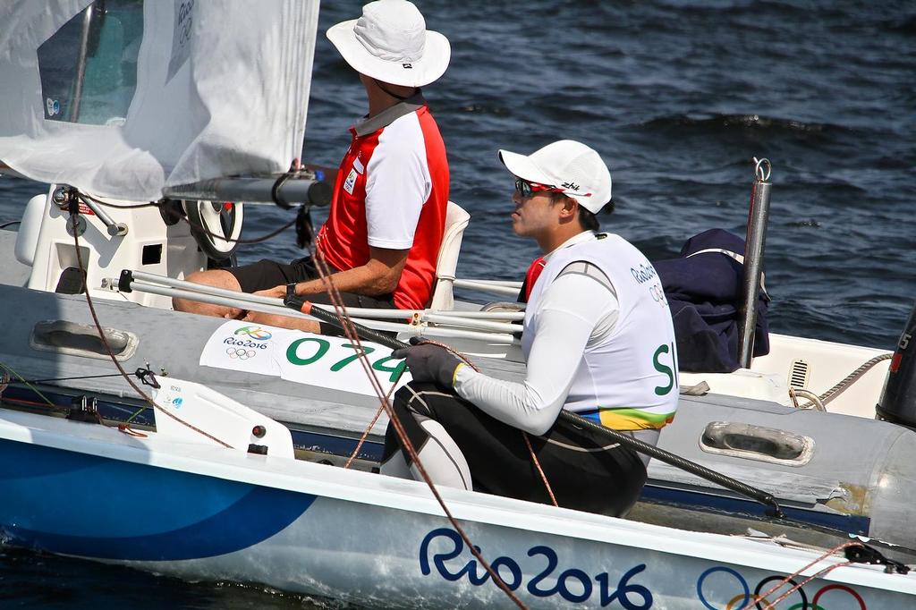 Team Talk - Elizabeth Yin (Singapore), Laser Radial - Day 2 photo copyright Richard Gladwell www.photosport.co.nz taken at  and featuring the  class
