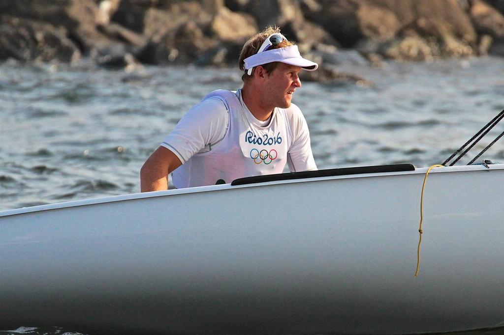 A pensive Josh Junior (NZL) on the return to the marina after Day 1 in the Finns photo copyright Richard Gladwell www.photosport.co.nz taken at  and featuring the  class