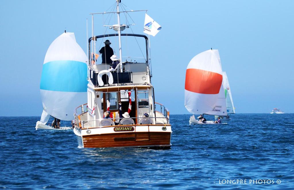 Race Committee Boat Defiant tows racers to race course - 50th Governor's Cup International Junior Match Racing Championship photo copyright Mary Longpre taken at  and featuring the  class