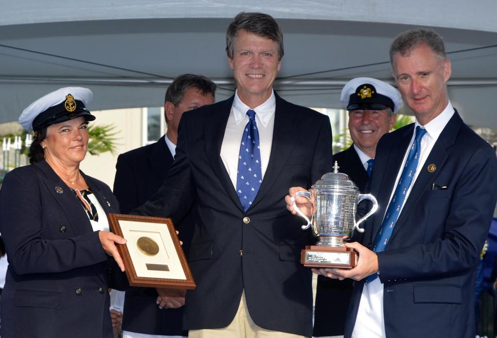 H.L. DeVore, Warrior Won's navigator, collects the George W. Mixter Trophy for a 