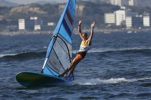 Dorian van Rijsselberge celebrates gold - RS:X Men - Rio 2016 Olympic Games photo copyright  Jesus Renedo http://www.sailingstock.com taken at  and featuring the  class