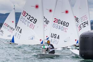 Italy's Alessando Angelini competing in the opening race of the KBC Laser Radial World Championships being hosted by the Royal St. George Yacht Club and Dun Laoghaire Harbour. photo copyright David Branigan - Oceansport.ie taken at  and featuring the  class