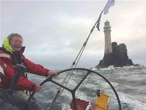 Andrew McIrvine rounds the Fastnet Rock at the helm photo copyright  Louay Habib taken at  and featuring the  class