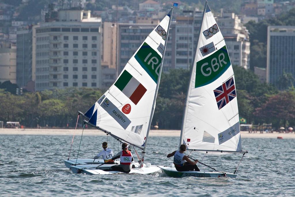 Front of fleet action downwind in Laser Radial medal Race - 2016 Olympic Regatta photo copyright Richard Gladwell www.photosport.co.nz taken at  and featuring the  class