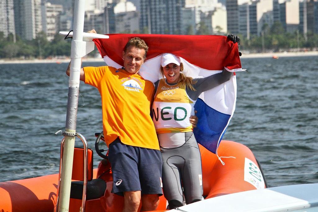 New Olympic Champion - Marit Boeuwmeester (NED) with her coach - Laser Radial class - 2016 Olympics photo copyright Richard Gladwell www.photosport.co.nz taken at  and featuring the  class