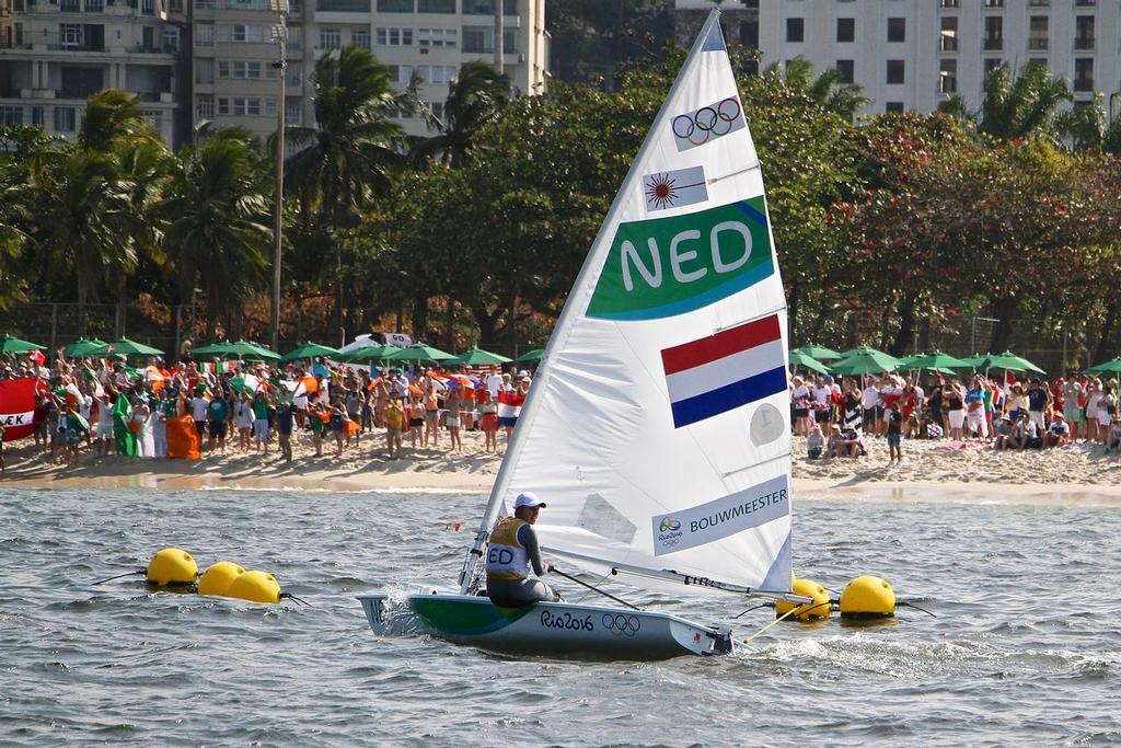 Marit Bouwmeester (NED)  heads for the fans on the beach - after the Laser Radial medal race  - Laser Radial - 2016 Olympics photo copyright Richard Gladwell www.photosport.co.nz taken at  and featuring the  class