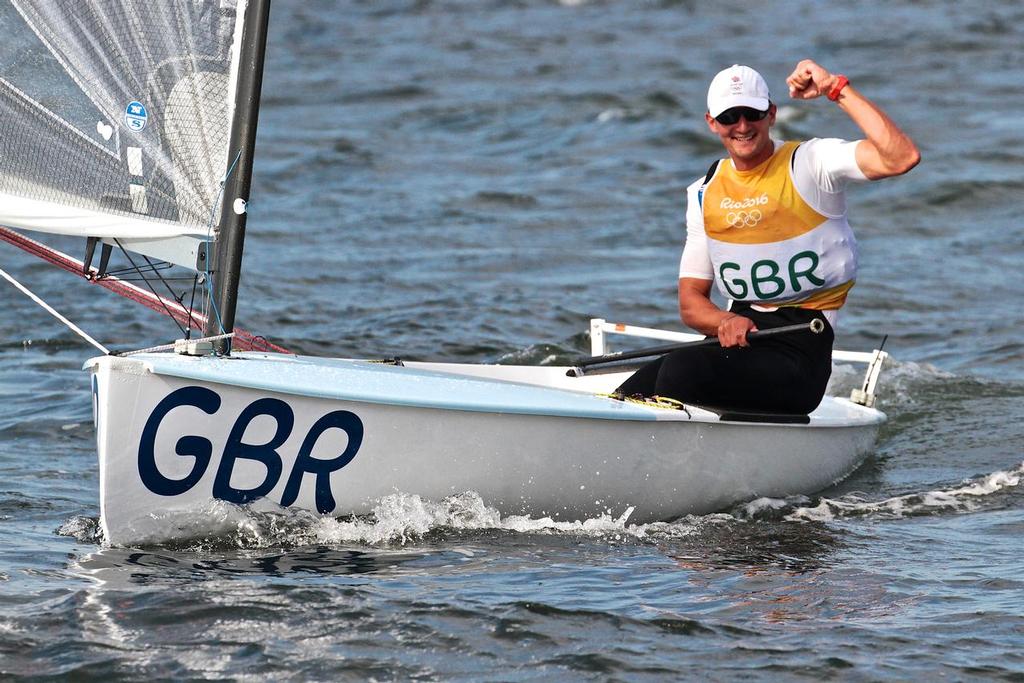 Done it - Giles Scott (GBR) confirms his Gold Medal win after the finish of the Medal race in the Finn Class photo copyright Richard Gladwell www.photosport.co.nz taken at  and featuring the  class