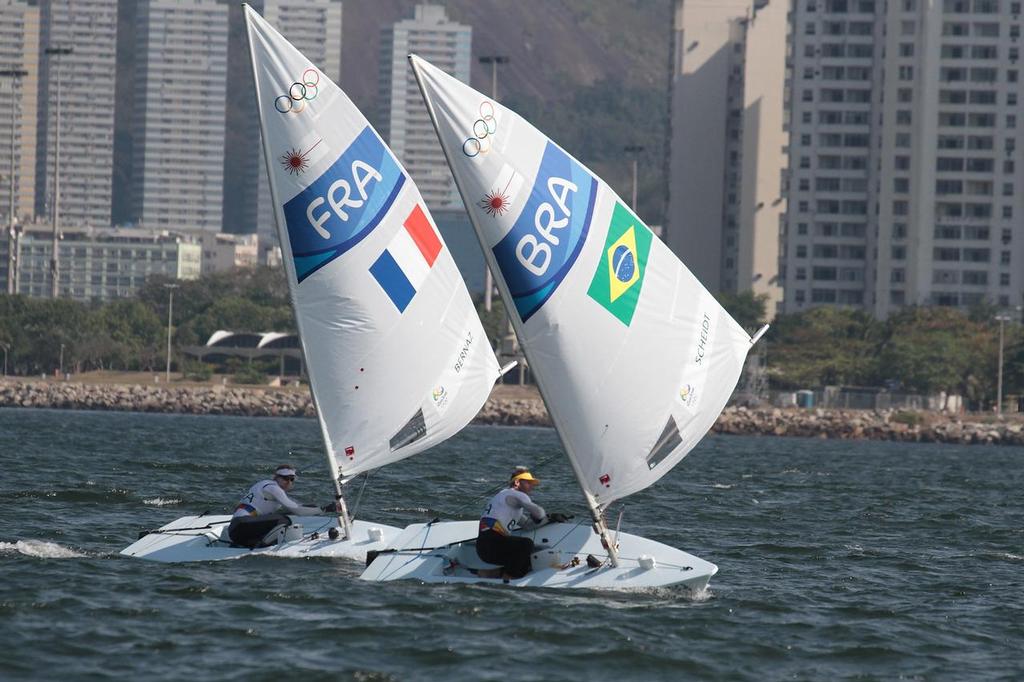 Robert Scheidt (BRA) leads JP Berna (FRA) on the downwind leg o the Medal race - Mens Laser, 2016 Olympics photo copyright Richard Gladwell www.photosport.co.nz taken at  and featuring the  class