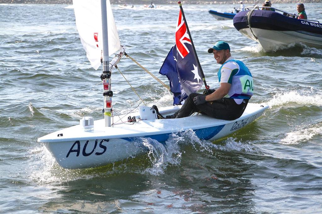 Tom Burton (AUS) celebrates after winning the Gold medal in the Mens Laser class - 2016 Olympics photo copyright Richard Gladwell www.photosport.co.nz taken at  and featuring the  class