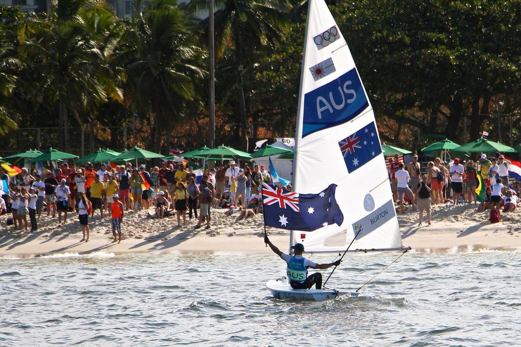 Tom Burton (AUS) heads for the beach to acknowledge his supporters and fans - Mens Laser - 2016 Olympics photo copyright Richard Gladwell www.photosport.co.nz taken at  and featuring the  class