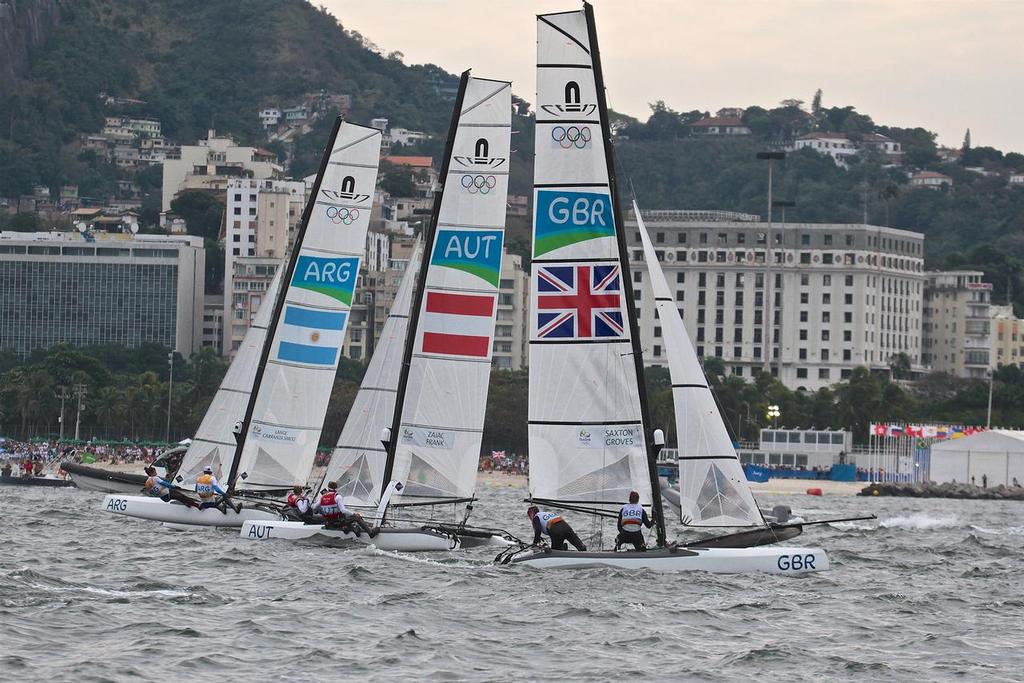 GBR turns to restart, Gold medalist ARG also has had to resolve some start line issues - Nacra 17 Medal race - Summer Olympics photo copyright Richard Gladwell www.photosport.co.nz taken at  and featuring the  class