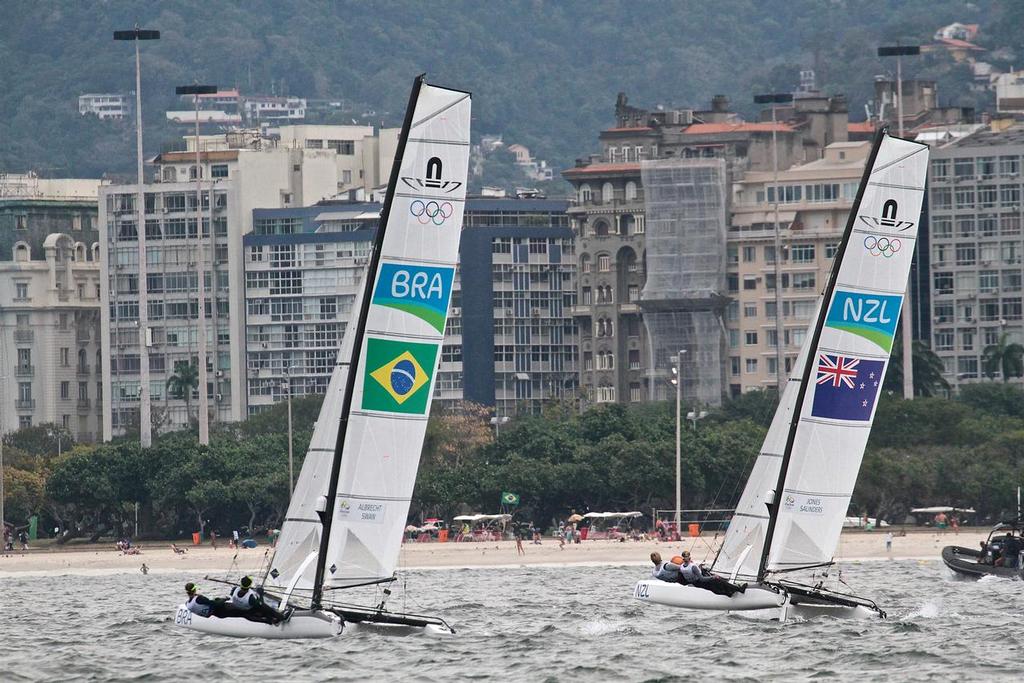 New Zealand and Brazil head for the beach on leg 1 of the Nacra 17 Medal Race - Summer Olympics photo copyright Richard Gladwell www.photosport.co.nz taken at  and featuring the  class