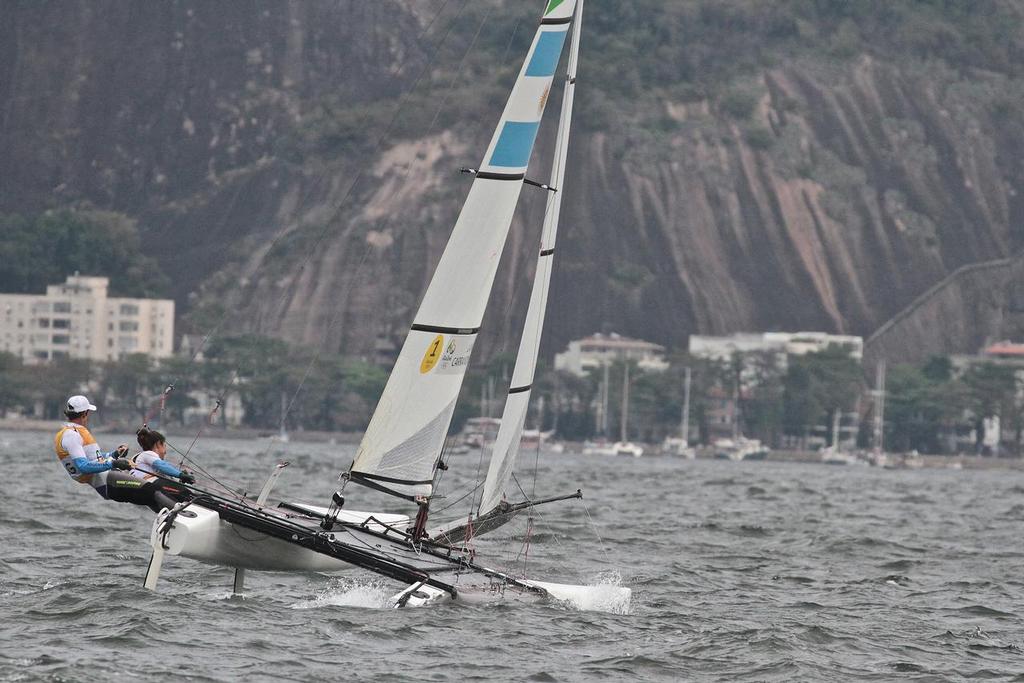 Santiago Lange and Cecilla Saroli head upwind for the second time in the Nacra 17 Medal race. Summer Olympics photo copyright Richard Gladwell www.photosport.co.nz taken at  and featuring the  class