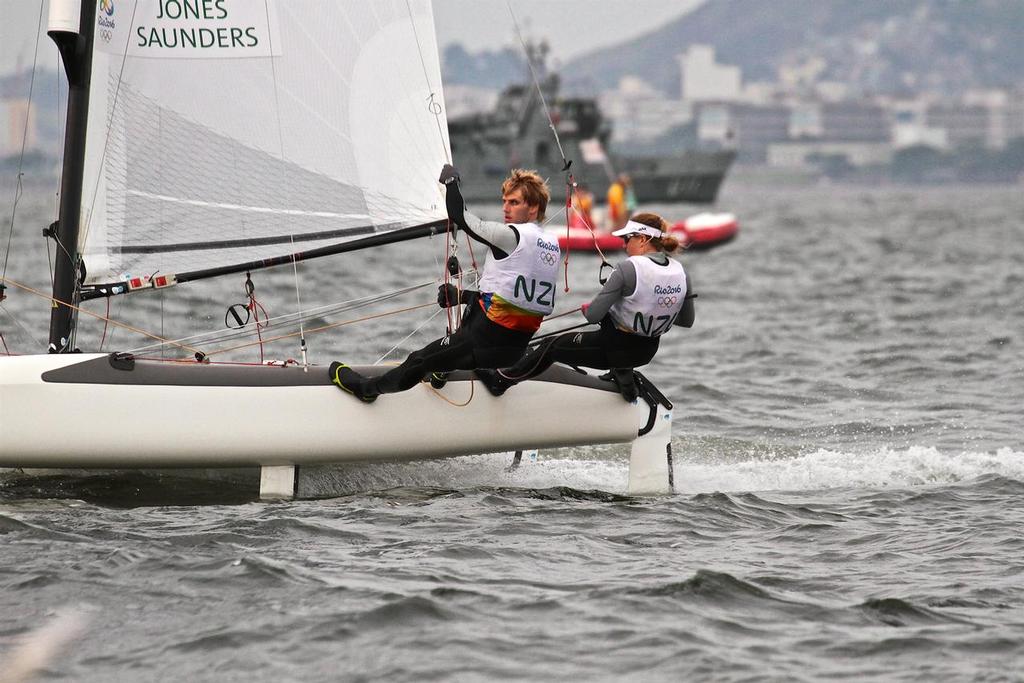 Jason Saunders and Gemma Jones cross the finish line - NZL Nacra 17 Medal Race, Rio de Janeiro 2016 Olympic Sailing Regatta. photo copyright Richard Gladwell www.photosport.co.nz taken at  and featuring the  class