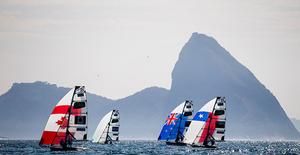 49er FX - Victoria Travascio / Maria Sol Branz (ARG); Erin Rafuse / Danielle Boyd (CAN); Francisca Arantza Gumucio / Begona Gumucio (CHI); Alex Maloney / Molly Meech (NZL) - 2016 Rio Olympic and Paralympic Games photo copyright Sailing Energy/World Sailing taken at  and featuring the  class