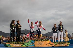 Hannah Mills and Saskia Clark (GBR) arrive on the podium for their gold medals - Rio 2016 Olympic Sailing Competition photo copyright Matias Capizzano http://www.capizzano.com taken at  and featuring the  class