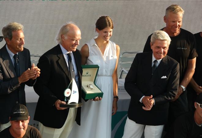 Thomas Bscher accepts the Wally class prize. With Princess Salwa Aga Khan and Gian Riccardo Marini of Rolex SA. - Maxi Yacht Rolex Cup © International Maxi Association http://www.internationalmaxiassociation.com