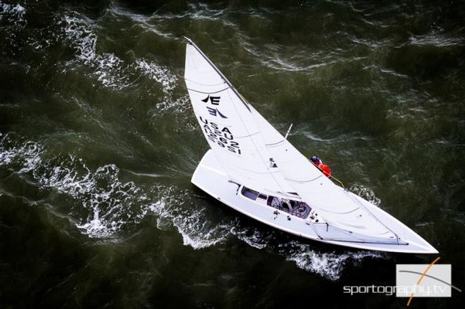 The Stars and Stripes of Steve 'Benji' Benjamin's team, from Seawanhaka Corinthian Yacht Club Connecticut USA, leads the Etchells World Championship after three races © Sportography.tv