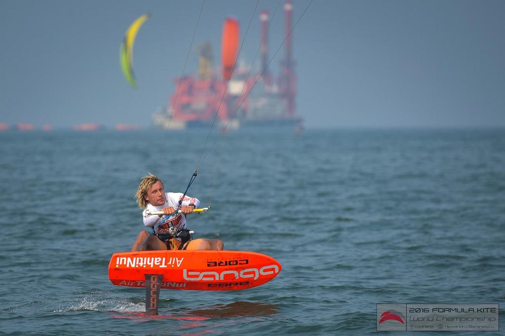 French rider Theo Lhostis pushes hard in light breezes - 2016 IKA Formula Kite (Foil) World Championships—Day Five © Alexandru Baranescu