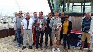 The crew of Columbus Circle receiving the winner's trophy in Cherbourg - RORC Cherbourg Race photo copyright Ant Davey / RORC taken at  and featuring the  class