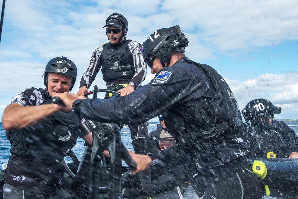 Emirates Team New Zealand training in 2013 with their safety gear. The lime green breather kits are clearly visible and worn on all crew.  © Chris Cameron/ETNZ http://www.chriscameron.co.nz