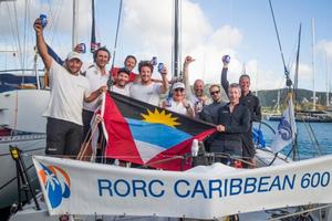 A jubilant crew on Eric de Turckheim's A13, Teasing Machine as they celebrate their IRC One class win and third place overall in the RORC Caribbean 600 in Antigua, February 2016 photo copyright  ELWJ Photography taken at  and featuring the  class