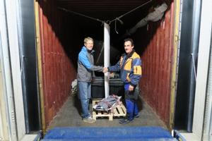 2015 World Champion Chris Rast loading EFG SUI684 into a container for Miami - Melges 24 World Championship photo copyright EFG taken at  and featuring the  class