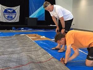 North Sails Michael Coxon with Noel 'Nitro' Drennan off Concubine recutting a headsail pre regatta. photo copyright North Sails Australia http://www.northsails.com.au taken at  and featuring the  class