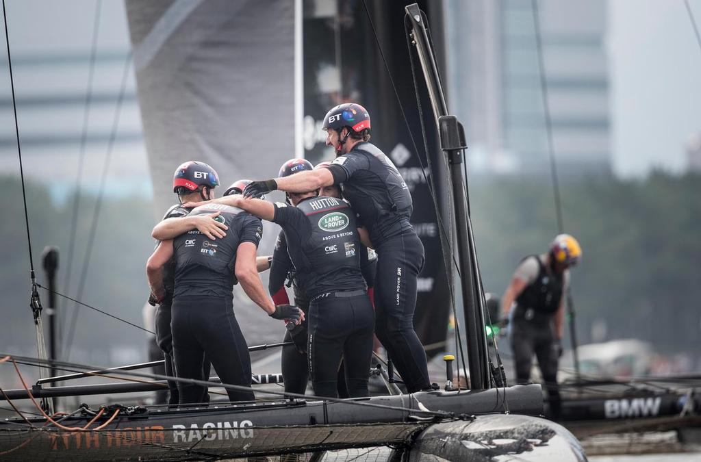 The Louis Vuitton America's Cup World Series. Fukuoka, Japan - November 20th: LandRover BAR skippered by Ben Ainslie with team mates David Carr, Giles Scott, Nick Hutton, Paul Campbell James and Ed Powys pictured here celebrating after winning both the event and World Series title photo copyright Lloyd Images taken at  and featuring the  class