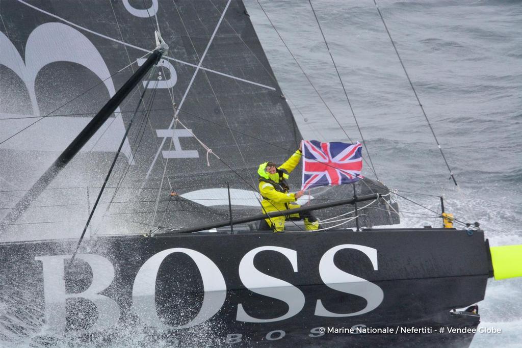 Hugo Boss, skipper Alex Thomson (GBR), off the Kerguelen Islands, flied over by the National French Marine Nivose Frigate, during the Vendee Globe, solo sailing race around the world, on November 30th, 2016 photo copyright Marine Nationale / Nefertiti / Vendee Globe vendeeglobe.org taken at  and featuring the  class