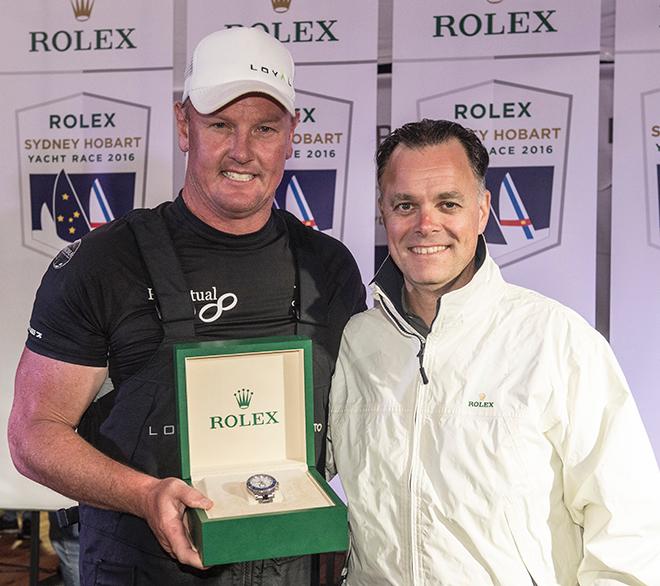 Anthony Bell (left), owner/skipper of Rolex Sydney Hobart line honours winner Perpetual LOYAL, presented with a Rolex Yacht-Master II timepiece by Joel Aeschlimann, Rolex Geneva ©  Rolex/ Kurt Arrigo http://www.regattanews.com