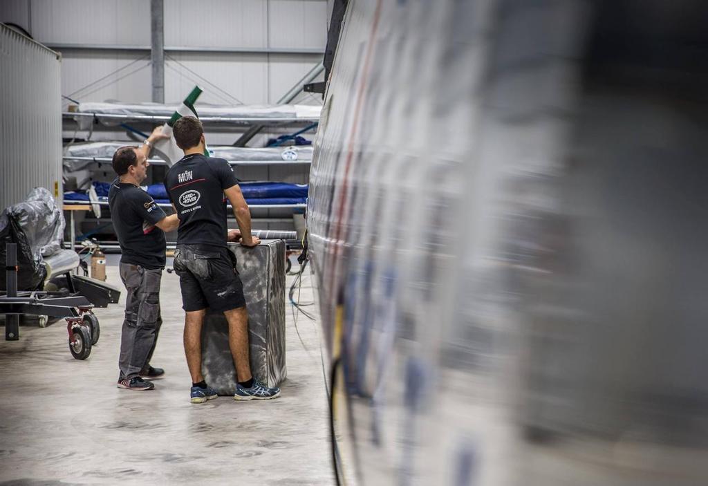Sailing team's Bleddyn Mon getting the Wing ready ahead of her first sailing day in Bermuda - Land Rover BAR, December 2016 Bermuda &copy; Alex Palmer