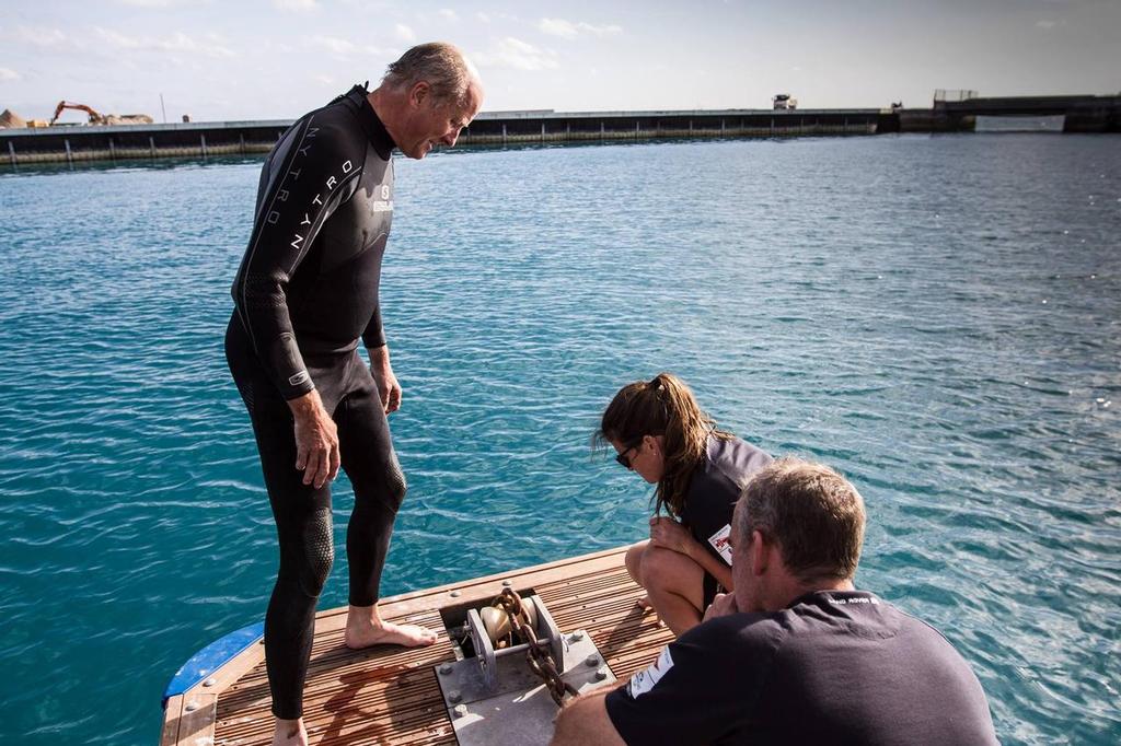 Graham Goff & Natalie Evelegh from the shore team checking the new MDL Marinas pontoon system - Land Rover BAR, December 2016 Bermuda &copy; Alex Palmer