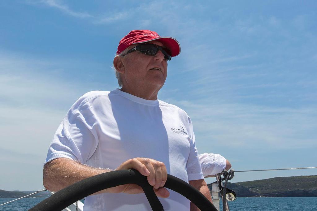 Jim Delegat helming his VO70, Giacomo. - Rolex Sydney Hobart Yacht Race © Andrea Francolini