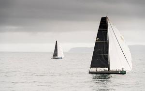 Varuna VI, from Germany, and Matt Allen's TP52 Ichi Ban in close competition off Tasman Island - Rolex Sydney Hobart Yacht Race photo copyright  Rolex/ Kurt Arrigo http://www.regattanews.com taken at  and featuring the  class