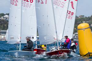 Leigh Richardson (red hull) brings a group around the leeward mark. - 39th Sabre Australian Championship photo copyright  Alex McKinnon Photography http://www.alexmckinnonphotography.com taken at  and featuring the  class
