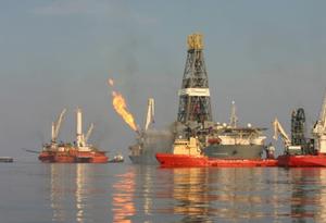 Two months after Deepwater Horizon exploded and sank, site response efforts were still burning natural gas captured from the ruptured well. photo copyright David Valentine taken at  and featuring the  class