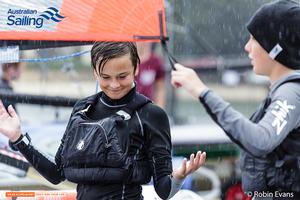 John-Mark Paul 29er Skipper derigging in the rain at Woollahra Sailing Club photo copyright Robin Evans taken at  and featuring the  class