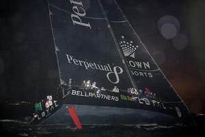 Anthony Bell's Perpetual Loyal crosses the finish line to claim line honours and set a new race record at the Rolex Sydney Hobart photo copyright  Rolex/ Kurt Arrigo http://www.regattanews.com taken at  and featuring the  class
