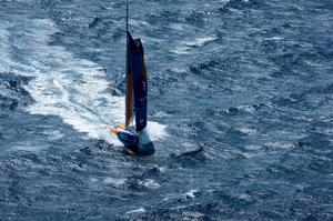 Vendée Globe – Jean Pierre Dick (St Michel-Virbac) sailing through Bass Strait photo copyright Rob Burnett / St-Michel Virbac / Vendee Globe taken at  and featuring the  class