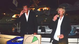 Racing duo enjoy Pizza and a cold beer on arrival in Grenada thanks to Port Louis Marina staff - RORC Transatlantic Race photo copyright Louay Habib / RORC taken at  and featuring the  class
