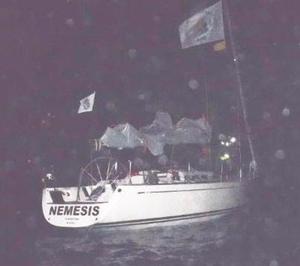 Torrential rain in Grenada as Nemesis arrives at the finish line and heads into the marina - RORC Transatlantic Race photo copyright Louay Habib / RORC taken at  and featuring the  class