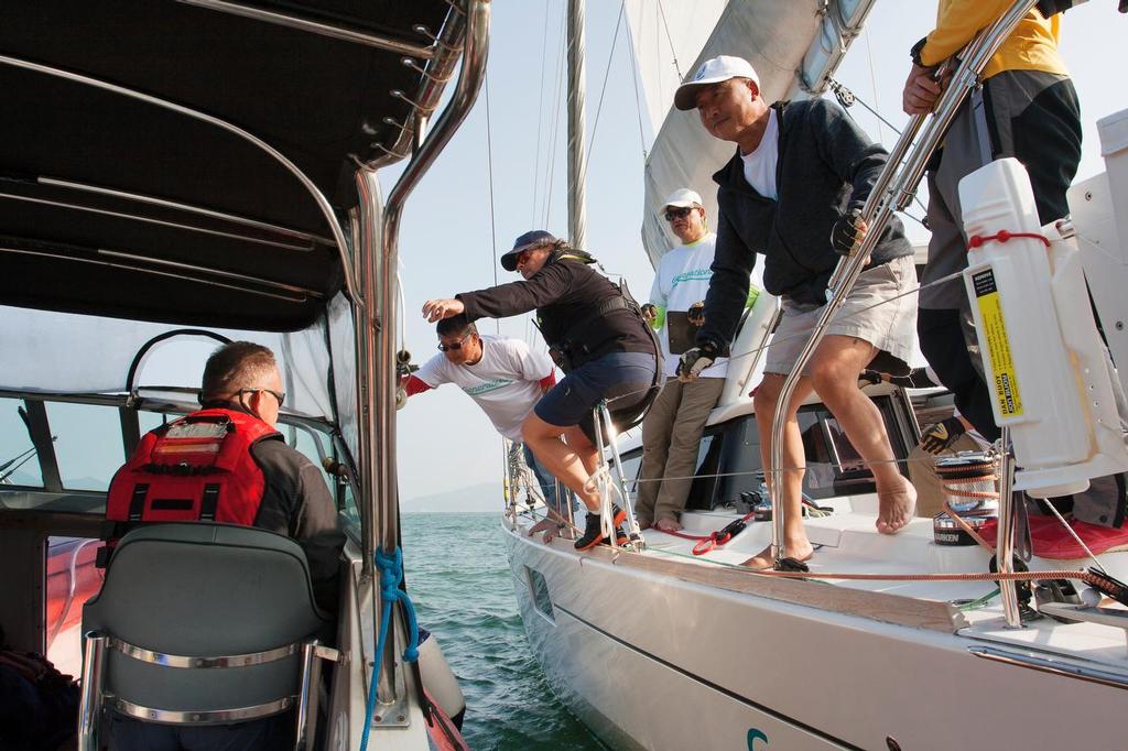 Retrieving the scrutineer. Beneteau Four Peaks Race 2017 © Guy Nowell / ABC