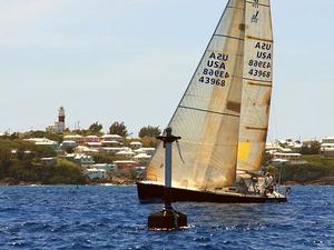 'Alibi', a J120 sailed double handed in the 2013 Marion Bermuda Race finishes off St David's Lighthouse. Co-skippers Gardner Grant and Stephen Fisk of Westport CT. 'Ailibi' was first in Class A and 12th in the 33-boat Founders Division. photo copyright Fran Grenon Spectrum Photography taken at  and featuring the  class