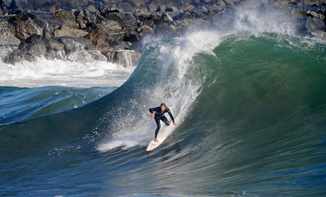 NEWPORT BEACH, CA - SEPTEMBER 01:  A surfer rides a high wave at The Wedge on September 1, 2011 in Newport Beach, California. Waves measuring up to 20 feet pounded the beach. A winter storm off the coast of Australia and New Zealand brought unusually high surf to the Southern California beaches.  (Photo by Kevork Djansezian/Getty Images) © Getty Images