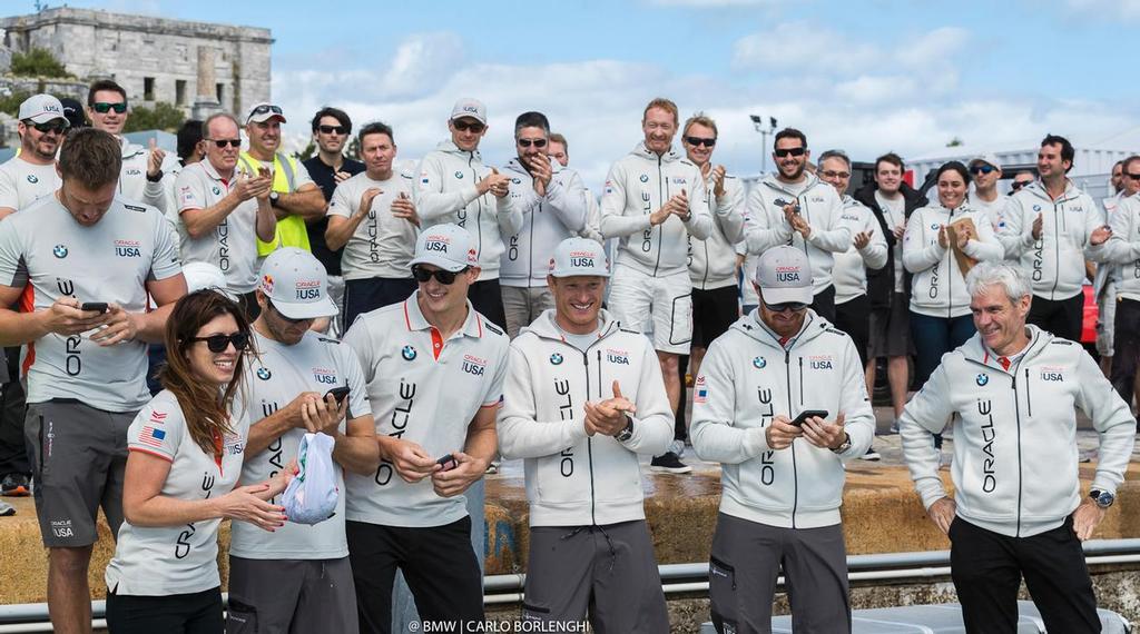 Oracle Team USA crew watch the launch of their AC50 in Bermuda - February 15, 2017 photo copyright BMW / Carlo Borlenghi taken at  and featuring the  class