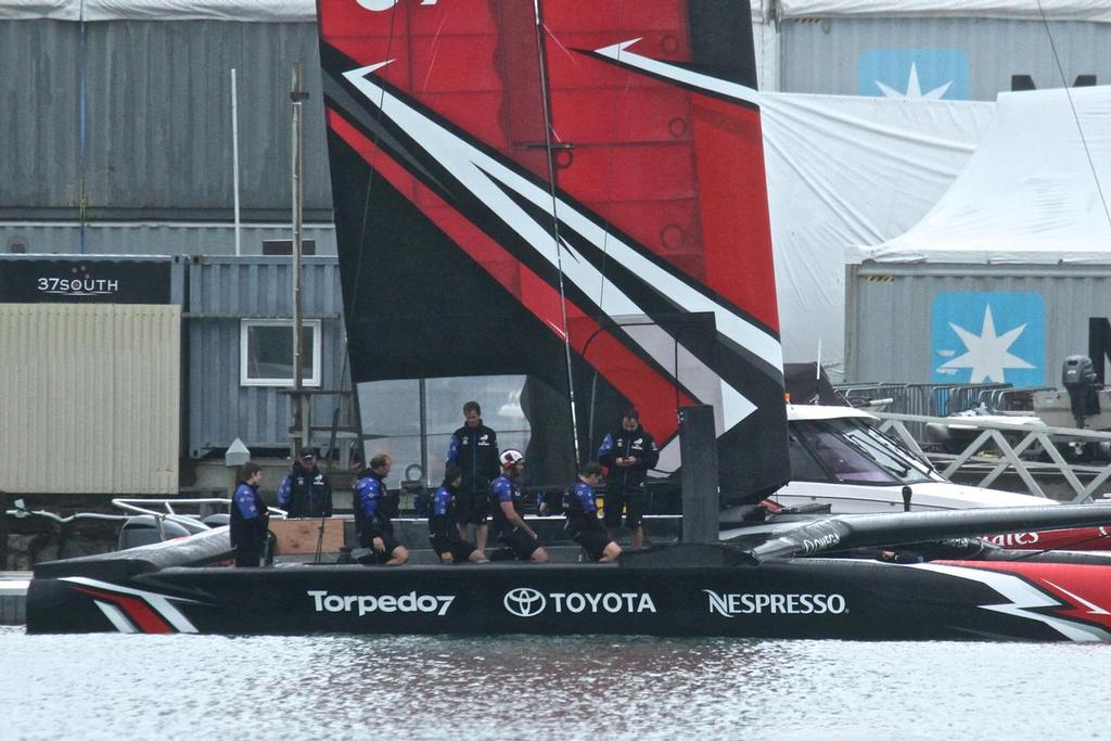 Emirates Team New Zealand's crew are sitting on the new cycle grinder pedestals waiting to go sailing for the first time. © Richard Gladwell www.photosport.co.nz