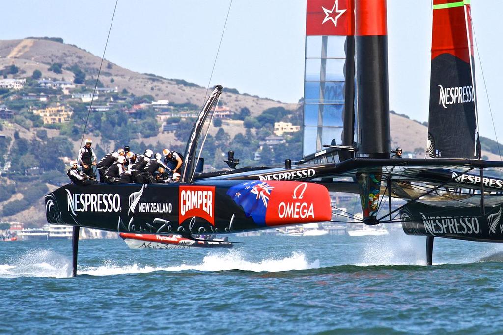 Open design AC72’s seem so last year -  11 crew, four grinding pedestals and sheet winches contrast with the one design AC50’s, cycling grinders, and no winches.  © Richard Gladwell www.photosport.co.nz