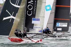 Compassmarkets struggles to get over the top of Maersk Line from New Zealand - JJ Giltinan 18ft Skiff Championship photo copyright Frank Quealey /Australian 18 Footers League http://www.18footers.com.au taken at  and featuring the  class
